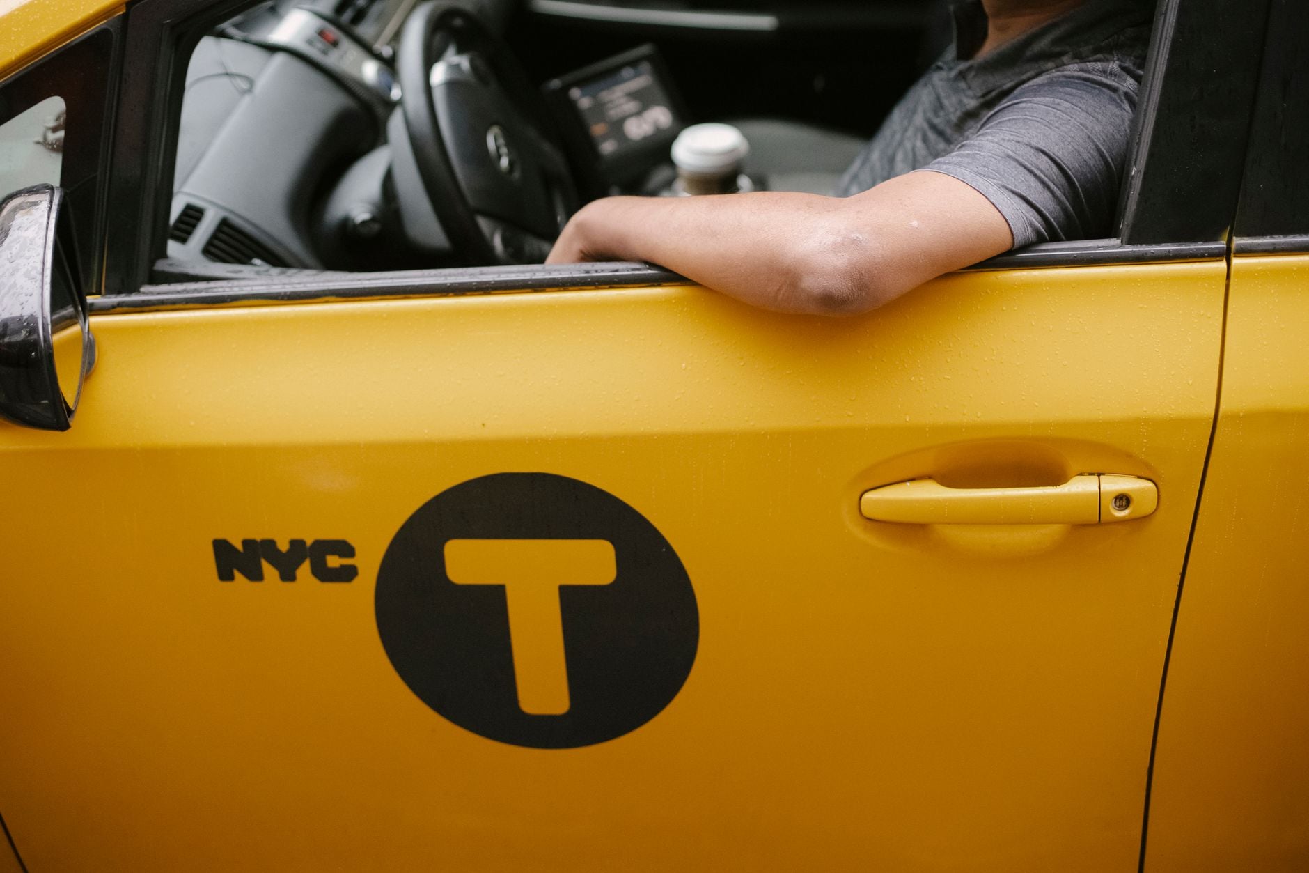 Taxi Driver Inside Vehicle